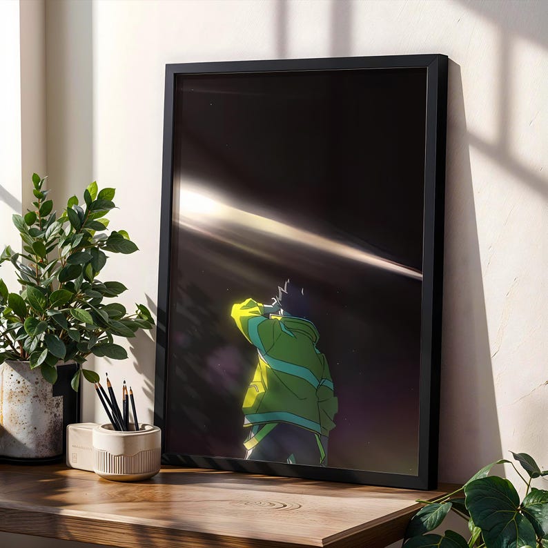 May include: A framed rectangular wall art print featuring an anime-style character seen from behind, wearing a bright lime green jacket with teal accents, looking up at a dark night sky with a prominent horizontal streak of light across the center.