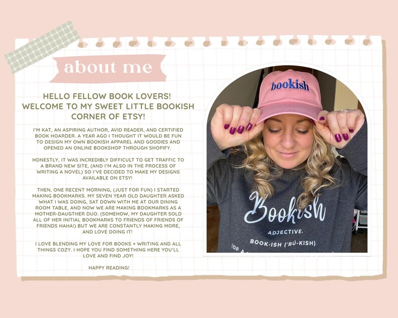 May include: A pink baseball cap with the word bookish embroidered in blue on the front, paired with a dark gray sweatshirt featuring the word Bookish in white script text followed by the definition of the word as an adjective.