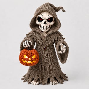May include: A crocheted grim reaper figure wearing a hooded brown robe with frayed edges and a central belt buckle. The figure has a white skull head with glowing red eyes and holds a bright orange crocheted jack-o'-lantern with internal light.
