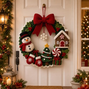 May include: A crocheted Christmas wreath featuring a large red bow at the top, a white snowman, a gingerbread house, a green Christmas tree, red mittens, a peppermint candy, and a green gift box, all accented with white snowflake details.