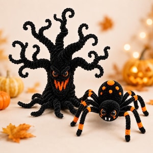 May include: A black pipe cleaner tree with curled branches, orange eyes, and a jagged orange mouth, positioned next to a black and orange spider with eight legs, orange spots on its back, large eyes, and two small white fangs.