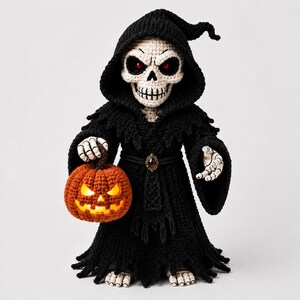 May include: A crocheted grim reaper figure wearing a black hooded robe with a dark red gem at the waist. The figure has a white skull face with glowing red eyes and holds a bright orange crocheted jack-o'-lantern with a lit interior.