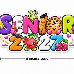May include: A colorful sticker featuring the text SENIOR 2027 with cartoon characters including a cheese wedge, lipstick, apple, pastry, cookie, strawberry, and cherries. A black graduation cap sits on the number 2. A ruler indicates 8 inches long.