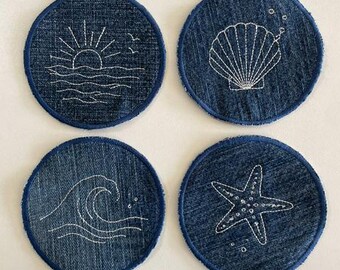 Juego de posavasos bordados con temática costera
