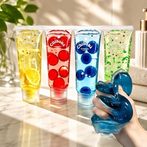 May include: Four clear squeeze tubes labelled Culboad, each filled with a different coloured gel containing small spheres and star-shaped glitter. The colours are yellow with lemon slices, red with cherry spheres, blue with blueberry spheres, and green.