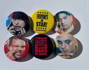 May include: A set of six circular pin-back buttons featuring portraits of band members and text. Two buttons have yellow and black backgrounds with the text EVERYONE'S A STAR! 5 SECONDS OF SUMMER and YOUR FAVORITE BOY BAND IS BACK.