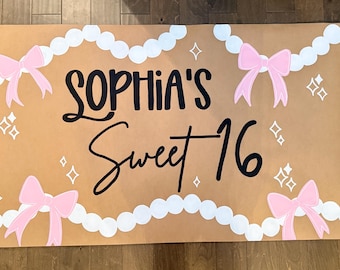 May include: A rustic wooden sign with the text "Welcome to our home" in white lettering. The sign features a distressed finish and a simple, inviting design, perfect for entryway decor.