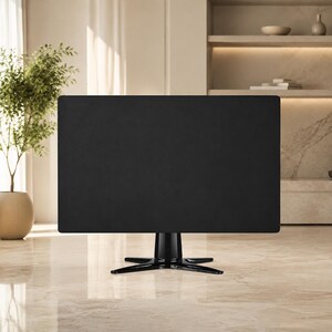 May include: A rectangular black monitor cover with a smooth, matte texture. The cover is designed to fit over a computer screen and features a central opening at the bottom to accommodate the stand, which has a glossy black four-pronged base.
