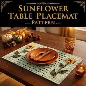 May include: A light green rectangular crochet placemat featuring two sunflower motifs with brown centers and yellow petals. The placemat has a triangular openwork pattern and is set on a wooden table with a brown plate, fork, and knife.