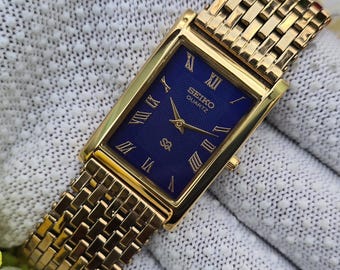 Vintage Seiko Tank Quartz Blue Roman Dial GoldTone Rectangular Refurbished Japan Made Unisex watch