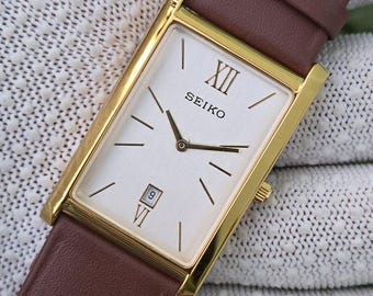 Vintage Seiko Tank Quartz Silver Dial with Date GoldTone Rectangle Leather Strap Refurbished watch