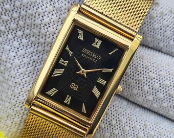 Vintage Seiko Tank Quartz Black Roman Dial GoldTone Rectangular Refurbished Japan Made Unisex watch