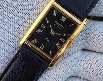 Vintage Seiko Tank Quartz Black Roman Dial GoldTone Rectangular Refurbished Japan Made Unisex  WristWatch