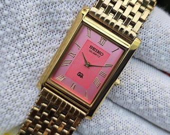 Vintage SeikoTank Quartz Pink Roman Dial GoldTone Rectangular Refurbished Japan Made Unisex Wrist watch
