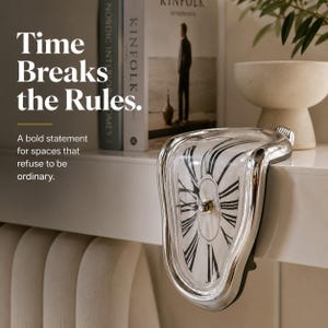 Könnte beinhalten: Eine silberfarbene, schmelzende Uhr mit weißem Zifferblatt, schwarzen römischen Ziffern und schwarzen Zeigern. Die Uhr hängt über der Kante eines weißen Regals. Der Text auf dem Bild lautet: Time Breaks the Rules. A bold statement for spaces that refuse to be ordinary.