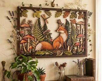 May include: A rectangular wooden wall art piece featuring a carved fox sitting among ferns, mushrooms, and leaves. The scene includes a dragonfly, a butterfly, and a snail, all rendered in natural tones of orange, green, and brown within a dark frame.