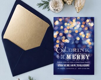 May include: A navy blue envelope with a gold liner and a rectangular invitation card featuring a dark blue background with bokeh lights and the text Eat, DRINK & BE MERRY. The card includes event details and is surrounded by silver ornaments.