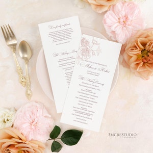 May include: A wedding ceremony program with a floral design in pink and white. The program lists the order of events for the wedding ceremony, including the entrance of the bride, the reading, the exchange of vows, and the signing of the register. The program also includes the names of the bride and groom, Melissa and Robert, and the date of the wedding, August 25th, 2023.