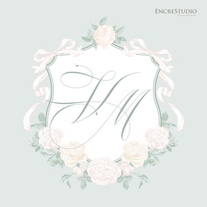 May include: A decorative crest featuring the letters HM in elegant sage green calligraphy, framed by pale pink roses and flowing ribbons on a light grey background. The text ENCRESTUDIO DESIGN&PRINT appears in the top right corner.