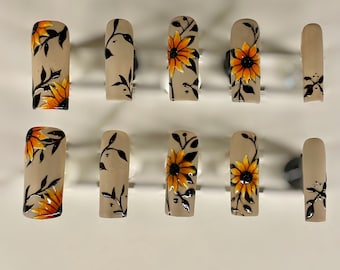 Uñas de girasol