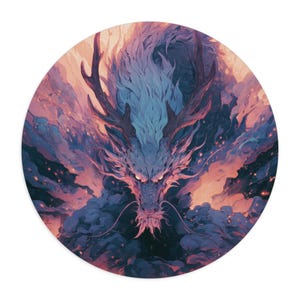 May include: A circular wall art piece featuring a detailed illustration of a dragon with large antlers, flowing blue and purple fur, and glowing eyes, surrounded by swirling clouds of pink and dark blue smoke with scattered glowing embers.