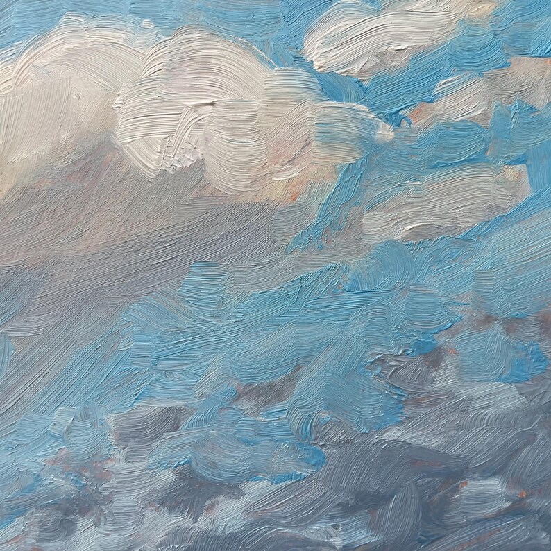 Detail view of the luminous cloud forms in October Morning Along Miami Lane, a New Mexico landscape painting by Santa Fe artist Dawn Chandler. Delicate grays, whites, and pale rose tones drift across a deepening blue sky above the Sangre de Cristo Mountains.