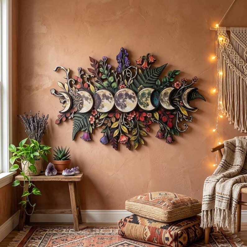 May include: A horizontal wall hanging featuring a series of moon phases depicted in circular wooden panels, surrounded by intricate, multi-colored carved foliage, flowers, and fern leaves in shades of green, purple, red, and yellow.