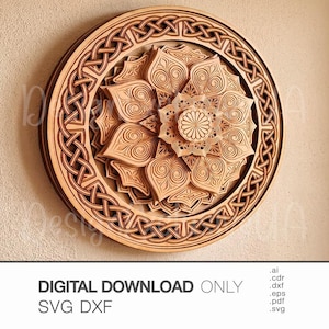 May include: A circular wooden wall art piece featuring a multi-layered mandala design with intricate floral petals and a central sunburst motif, surrounded by a detailed Celtic knot border. The text reads DIGITAL DOWNLOAD ONLY SVG DXF.