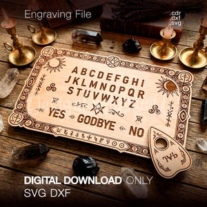 May include: A rectangular wooden spirit board featuring the alphabet, the words YES, GODBYE, and NO, and various occult symbols engraved on the surface. A matching wooden planchette with a circular cutout is positioned on the board.