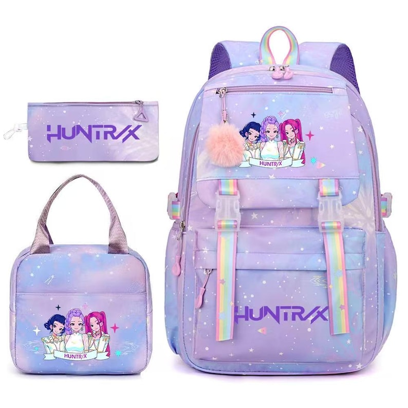 May include: A purple and blue gradient backpack, lunch bag, and pencil case set featuring a star pattern and the text HUNTR/X. The backpack includes rainbow straps, a fluffy pink pom-pom charm, and a graphic of three anime-style characters.