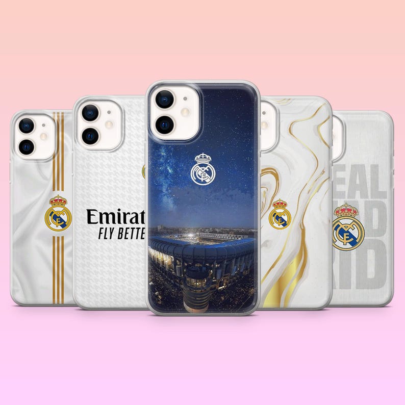 May include: Five smartphone cases featuring Real Madrid branding. Designs include a stadium night view, white fabric textures with gold stripes, the Emirates Fly Better logo, gold marble swirls, and the Real Madrid text with the club crest.