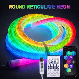 May include: A coiled, flexible, reticulated neon LED light strip emitting a multi-colored gradient glow. It includes a USB connector, a white remote control with various function buttons, and a smartphone displaying a Symphony Controller app interface.