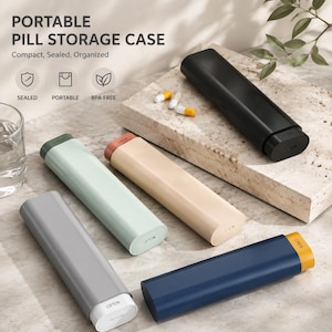 May include: Five portable pill storage cases in grey, sage green, beige, black, and navy blue with yellow accents. Each rectangular case features an end cap labelled OPEN. The text PORTABLE PILL STORAGE CASE, Compact, Sealed, Organized is visible.