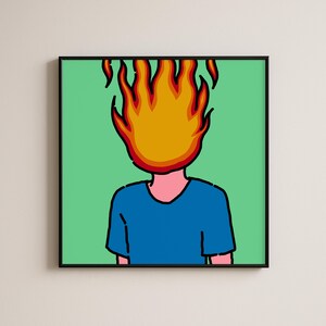 Könnte beinhalten: Ein quadratischer Wandkunstdruck in einem Rahmen mit einer Cartoon-Illustration einer Person von hinten, die ein blaues T-Shirt vor einem einfarbigen hellgrünen Hintergrund trägt. Der Kopf der Person ist durch eine große orange-gelbe Flamme ersetzt.