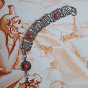 Vintage Paris charms bracelet in silver metal representing places in Paris