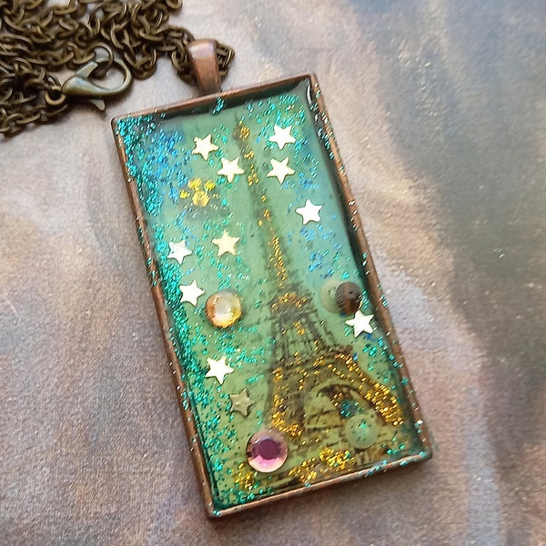 Pendentif  bronze cristal et paillettes tour Eiffel chaine bronze et étoiles paillettes