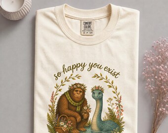 „Respektiere die Einheimischen“-Shirt | T-Shirt mit Bigfoot- und Nessie-Motiv | Geschenk für Kryptozoologie-Fans