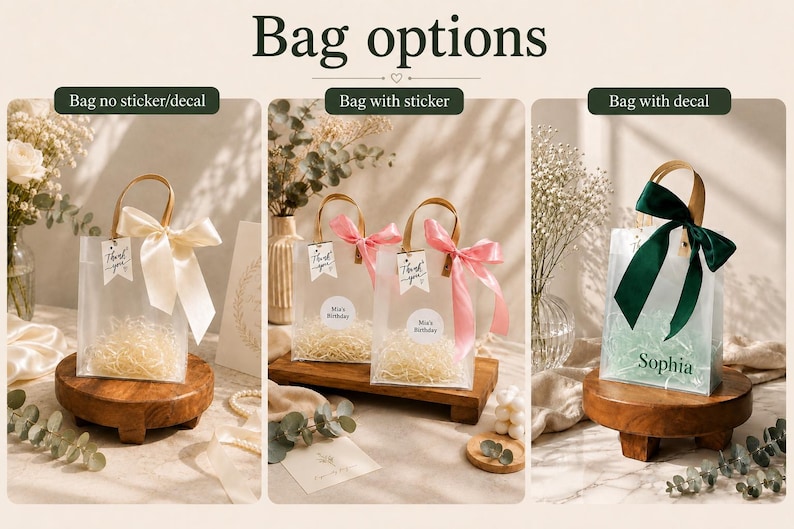 May include: A collection of clear gift bags with handles, displayed in three variations: one with a cream ribbon, two with pink ribbons and circular stickers, and one with a dark green ribbon and the name Sophia printed in dark green text.