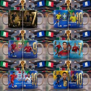 May include: A collection of ceramic mugs featuring soccer players in action, national team logos, and large gold jersey numbers. Each mug displays a unique athlete, including Cristiano Ronaldo, with vibrant team colors and stadium backgrounds.