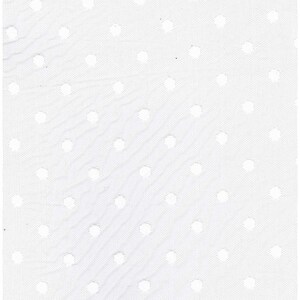 May include: A white fabric featuring a repeating pattern of small, evenly spaced circular cutouts. The material has a fine, mesh-like texture throughout, creating a consistent perforated design across the entire surface of the textile.