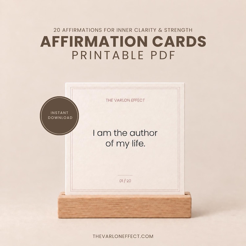 May include: A square affirmation card in a wooden stand featuring the text 'I am the author of my life.' The card includes the header '20 AFFIRMATIONS FOR INNER CLARITY & STRENGTH', 'AFFIRMATION CARDS PRINTABLE PDF', 'THE VARLON EFFECT', and '01/20'.