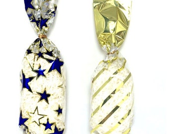 Gold accents and diagonal gold stripe designer bags with flat bottom. Limited quantity