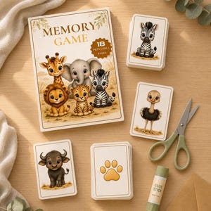 Puede incluir: Un juego de memoria imprimible que incluye una caja con ilustraciones de una jirafa, elefante, león, leopardo y cebra, con el texto MEMORY GAME y 18 PRINTABLE PAIRS. Incluye mazos de cartas con gráficos de animales, una huella, tijeras y pegamento.