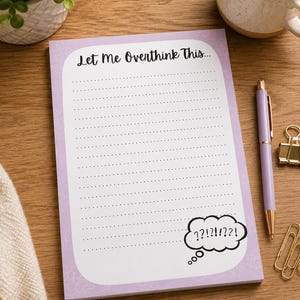 May include: A rectangular notepad with a light purple border and a white center featuring the text Let Me Overthink This at the top. The notepad has horizontal dotted lines for writing and a thought bubble graphic with question marks at the bottom.