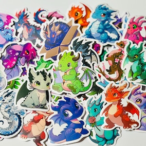 May include: A collection of assorted vinyl stickers featuring cartoon-style baby dragons in various colours including green, blue, red, pink, and white. The stickers depict dragons in different poses, some with wings, some holding items, and one inside a box.
