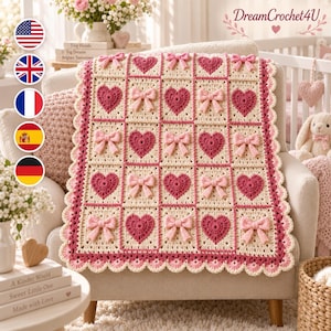 May include: A cream-colored crochet blanket featuring a grid of alternating dark pink hearts and light pink bows. The blanket has a scalloped border in shades of pink and cream. The text DreamCrochet4U is visible in the upper right corner.