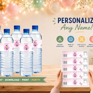 May include: Five clear plastic water bottles with pink labels featuring a cartoon mouse and the text MARRY, alongside a printed sheet of five identical labels. The labels include a barcode, nutritional facts, and a pink bow graphic design.
