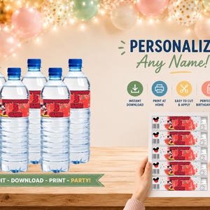 May include: Five clear plastic water bottles with red labels featuring Mickey Mouse, the text Happy Birthday, the number 5, and the name Oliver. A sheet of five identical rectangular labels is held up, showing the same red Mickey Mouse design.