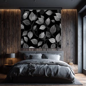 May include: A large square wall art piece featuring a repeating pattern of translucent white leaves against a solid black background. The leaves display intricate vein details and are arranged in a dense, overlapping botanical composition.