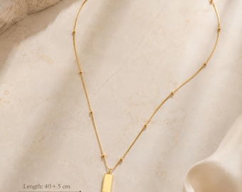 Collar minimalista de barra rectangular dorada • Joyería delicada para usar a diario